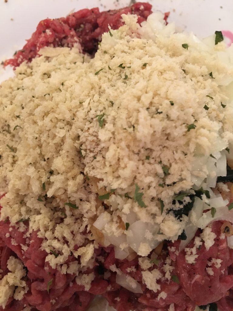 Meatball ingredients - minced beef, panko, egg, minced garlic, basil, oregano, onion, pepper and salt