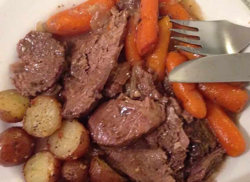 Pot Roast - Slow cooking with carrots and potatoes