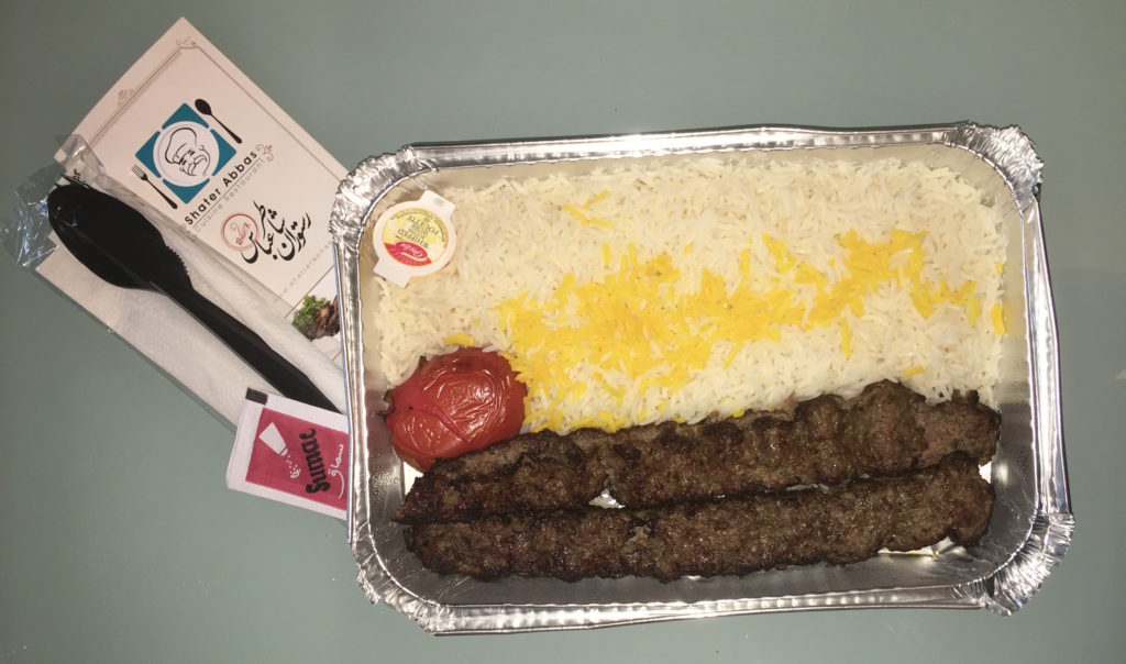 Koobideh Kebab - Two skewers of chef's lamb and beef special ground mix, basmati rice and grilled tomato