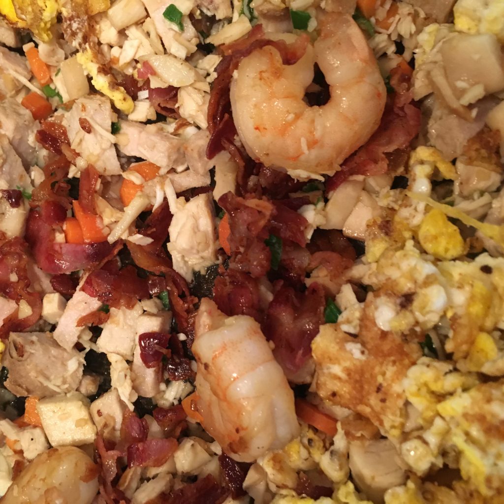 Crumbled Pancetta, Shrimp, egg, Chicken, Pork, Mushrooms, Carrots and Garlic ready to mix