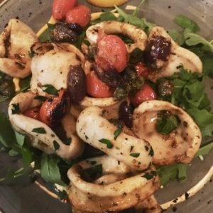 Calamari with arugula, capers, black olives, cherry tomatoes, parsley and ‘nduja aioli